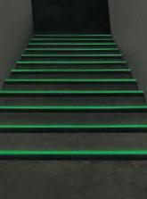 Non-slip adhesive glow tape reduces slips and falls on stairs treads